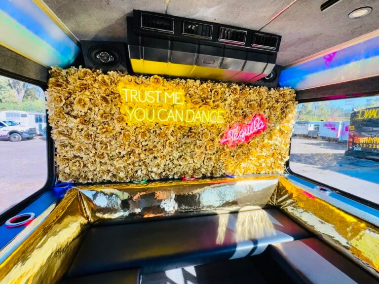 The Golden Bachelor Party Bus 22 Flower Wall For Selfies
