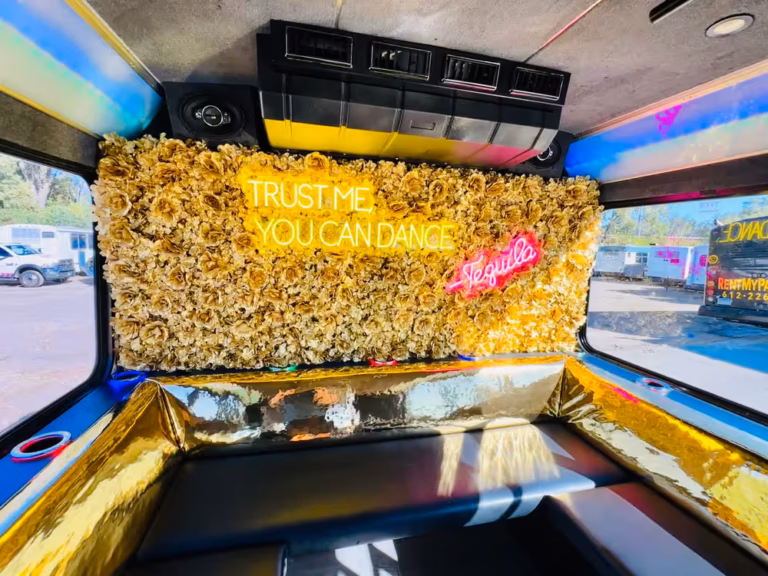 The Golden Bachelor Party Bus 22 Flower Wall For Selfies scaled